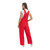 Back view of a woman modeling solid red Game Bibs overalls, showcasing the adjustable Y-back straps and spacious rear pockets.