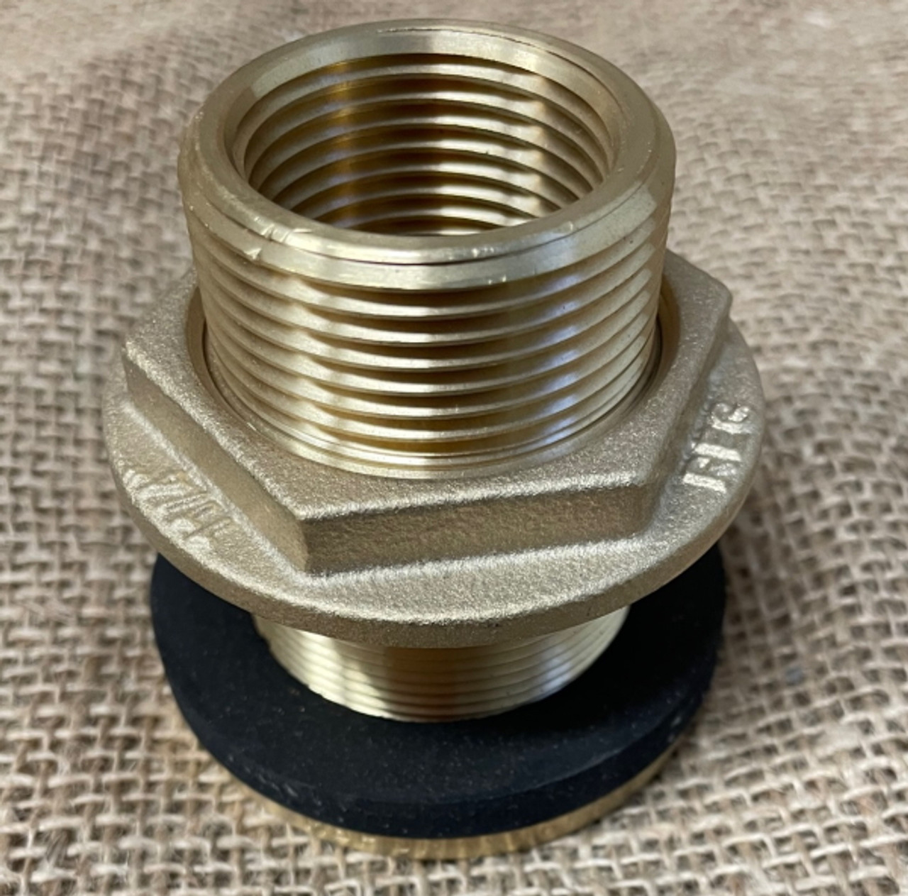 Brass tank outlet