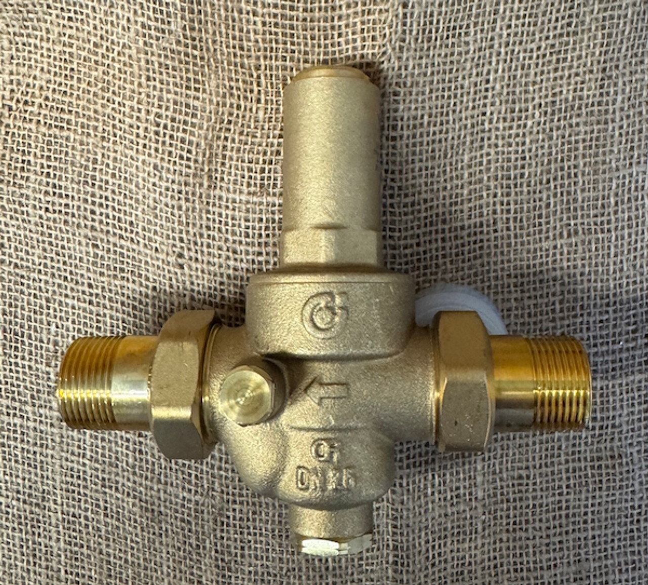 Caleffi 536 series pressure reducing valve to 2,000 kPa and water at up to 80 degrees C with unions and pressure gauge.