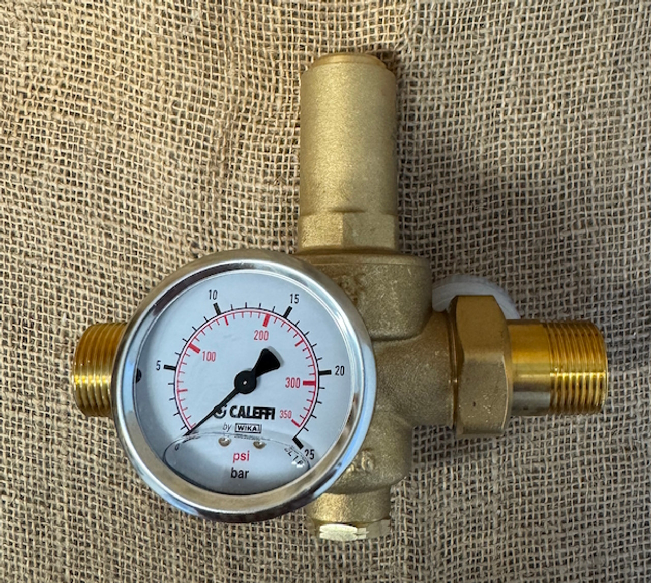 Caleffi 536 series pressure reducing valve to 2,000 kPa and water at up to 80 degrees C with unions and pressure gauge.