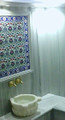 Border tile mural steam bath installation