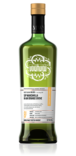 Sip manzanilla in an orange grove