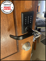 Carbine CDL2-SL8 Digital Lever Lock with PIN and Key Override. Matt Black. Installed on Wooden Door.