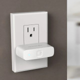 Ultraloq Bridge WiFi Adapter plugged into the socket