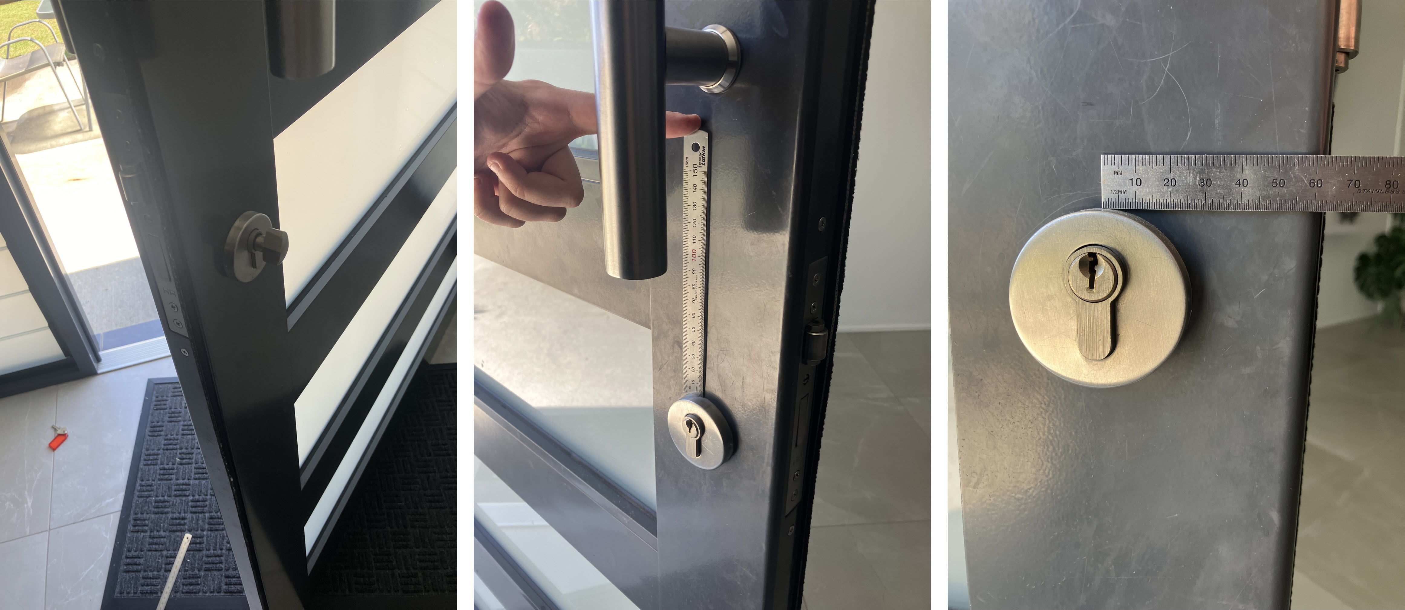 Entry door before installation showing existing large pull handles and traditional key entry