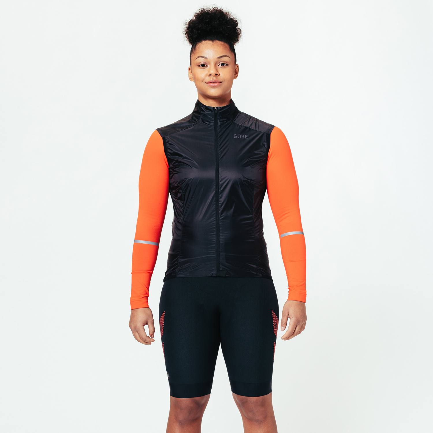 A product model is wearing the Ambient WINDSTOPPER® Vest Womens in size Small and is 173 cm / 5'8'' and weighs 65 kg / 143 lbs.