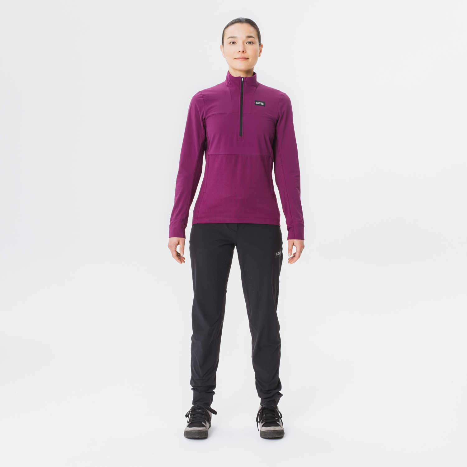 A product model is wearing the TrailKPR Hybrid 1/2-Zip Womens in size Small and is 172 cm / 5'7'' and weighs 57 kg / 125 lbs.