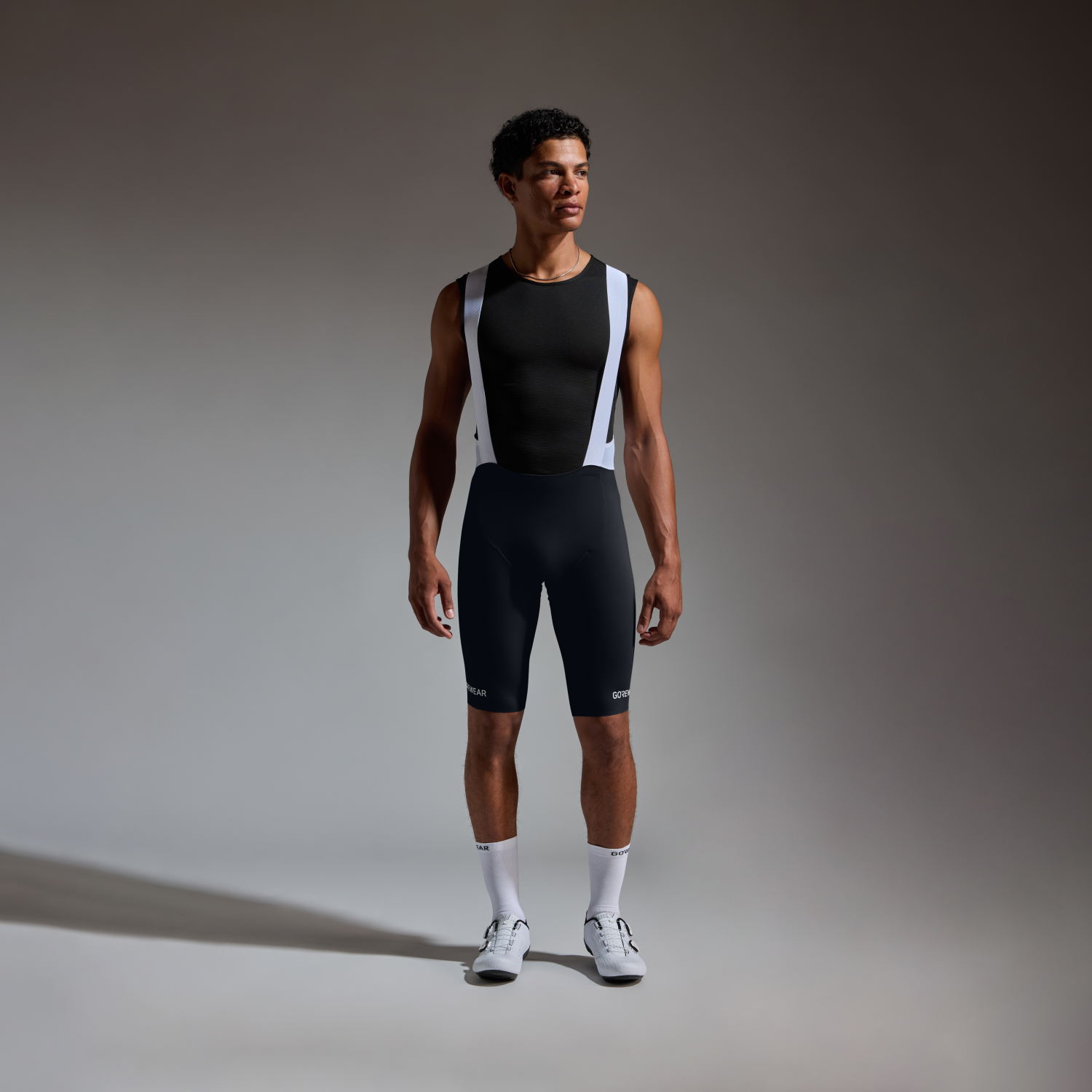 A product model is wearing the SPINSHIFT Bib Shorts Mens in size EU Large / US Medium and is 194 cm / 6'4'' and weighs 84 kg / 185 lbs.