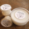 four containers of plug wax for mushroom log inoculation