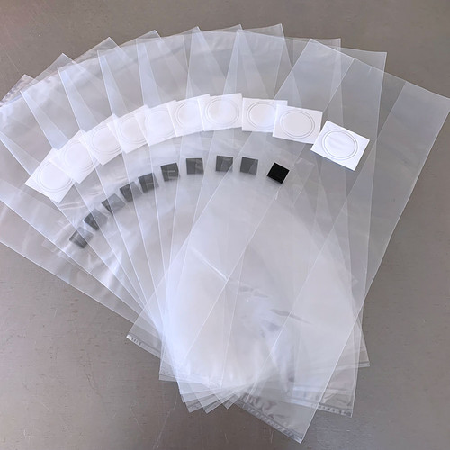 Autoclavable, gusseted polypropylene injection port bags with filter disc for spawn or mushroom block production.