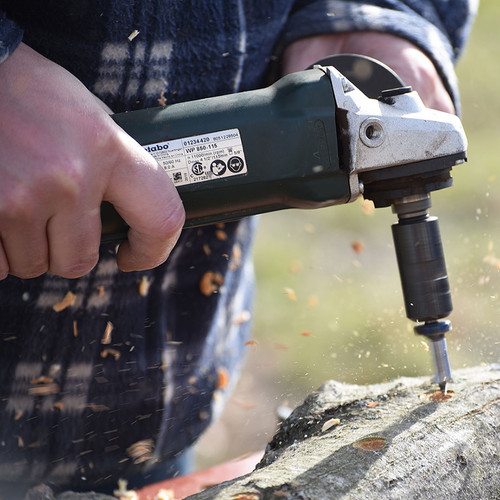 Side angle view of the  Express Drill Tool, a converted angle grinder for high-speed drilling.