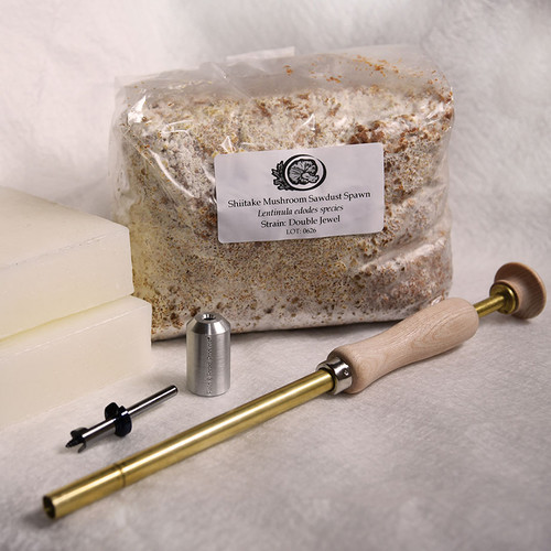 Shiitake sawdust spawn bundle includes spawn, angle grinder adapter, palm tool, bit and wax to inoculate mushroom logs. Shiitake sawdust spawn bundle includes spawn, angle grinder adapter, palm tool, bit and wax to inoculate mushroom logs.