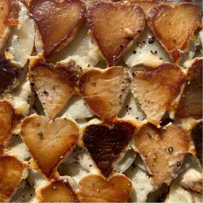 scalloped king oyster mushrooms and potatoes