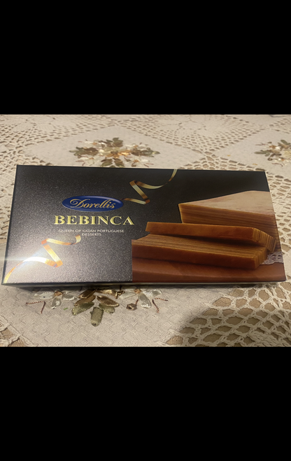 DORELLIS GOAN PORTUGUESE BEBINCA, QUEEN OF GOAN DESSERTS, IS A 7 LAYERED , 500 GMS CAKE, WHICH IS BAKED WITH PASSION, PATIENCE AND PRECISION AND WITH LIMIED INGREDIENTS WHICH GIVES IT ITS UNIQUE FLAVOUR DORELLIS GOAN PORTUGUESE BEBINCA, QUEEN OF GOAN DESSERTS, IS A 7 LAYERED , 500 GMS CAKE, WHICH IS BAKED WITH PASSION, PATIENCE AND PRECISION AND WITH LIMIED INGREDIENTS WHICH GIVES IT ITS UNIQUE FLAVOUR