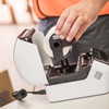 Various Label Options
Choose from a variety of die-cut or continuous labels and use the built-in cutter to trim your label to the precise length needed (up to three metres)