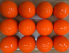 12 plain orange golf balls in 3 rows of 4 balls