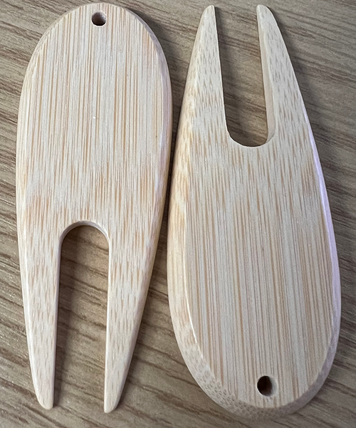 Two natural wood bamboo golf pitchforks