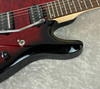 Sterling by Music Man JP100D John Petrucci guitar in ruby red burst