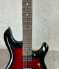 Sterling by Music Man JP100D John Petrucci guitar in ruby red burst