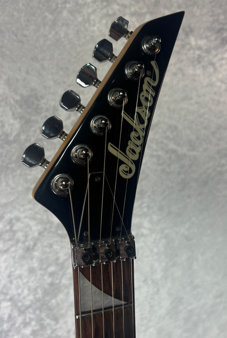 Jackson Rhoads RX10D electric guitar in transparent red finish w/ case