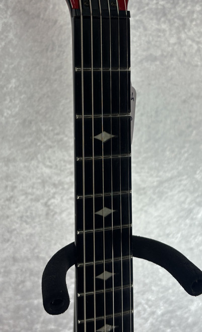 B.C. RICH Warlock NT neck through electric guitar red with black binding