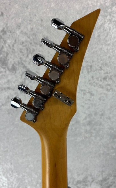 Vintage Westone Spectrum electric guitar with reverse headstock in reverse silverburst(?)