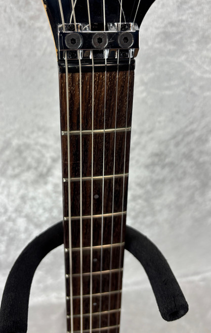 Vintage Westone Spectrum electric guitar with reverse headstock in reverse silverburst(?)