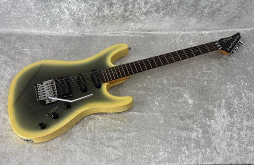 Vintage Westone Spectrum electric guitar with reverse headstock in reverse silverburst(?)