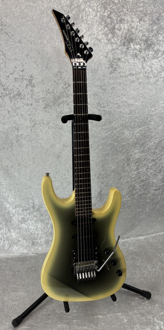 Vintage Westone Spectrum electric guitar with reverse headstock in reverse silverburst(?)