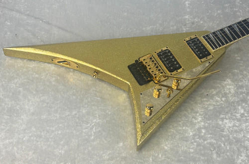 2016 USA Jackson Custom Shop Rhoads electric guitar in gold sparkle finish