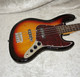 Vintage Brand VJ74 SSB J bass guitar in sunset sunburst finish