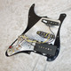 Loaded pickguard with single coil pickups and Jazzmaster style in bridge