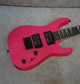 Jackson JS Series Dinky Minion JS1X guitar in Neon Pink finish