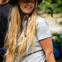 Women's UV Tec Polo - UV008W-GRE14-LIFESTYLE-1.jpg