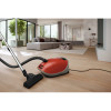 Miele Guard M1 Canister Vacuum Terra red living room