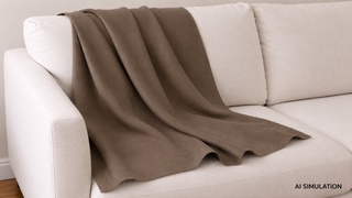 AI simulation of brown upholstery fabric draped over a light-colored sofa, showing fabric color, texture, and natural folds. The image is a digital visualization created from an actual fabric photograph and is intended to demonstrate color, pattern, and general appearance.