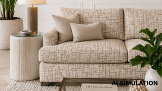 AI simulation of fabric SKU 7128313 Jarrett Tuscan Sun upholstery fabric, featuring an ivory and brown abstract grid pattern on a contemporary sofa to illustrate color, pattern scale, and upholstery use.