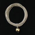 Silver Multi-Band Piano Wire  Bracelet w/Single Olive-Tone Pearl Drop