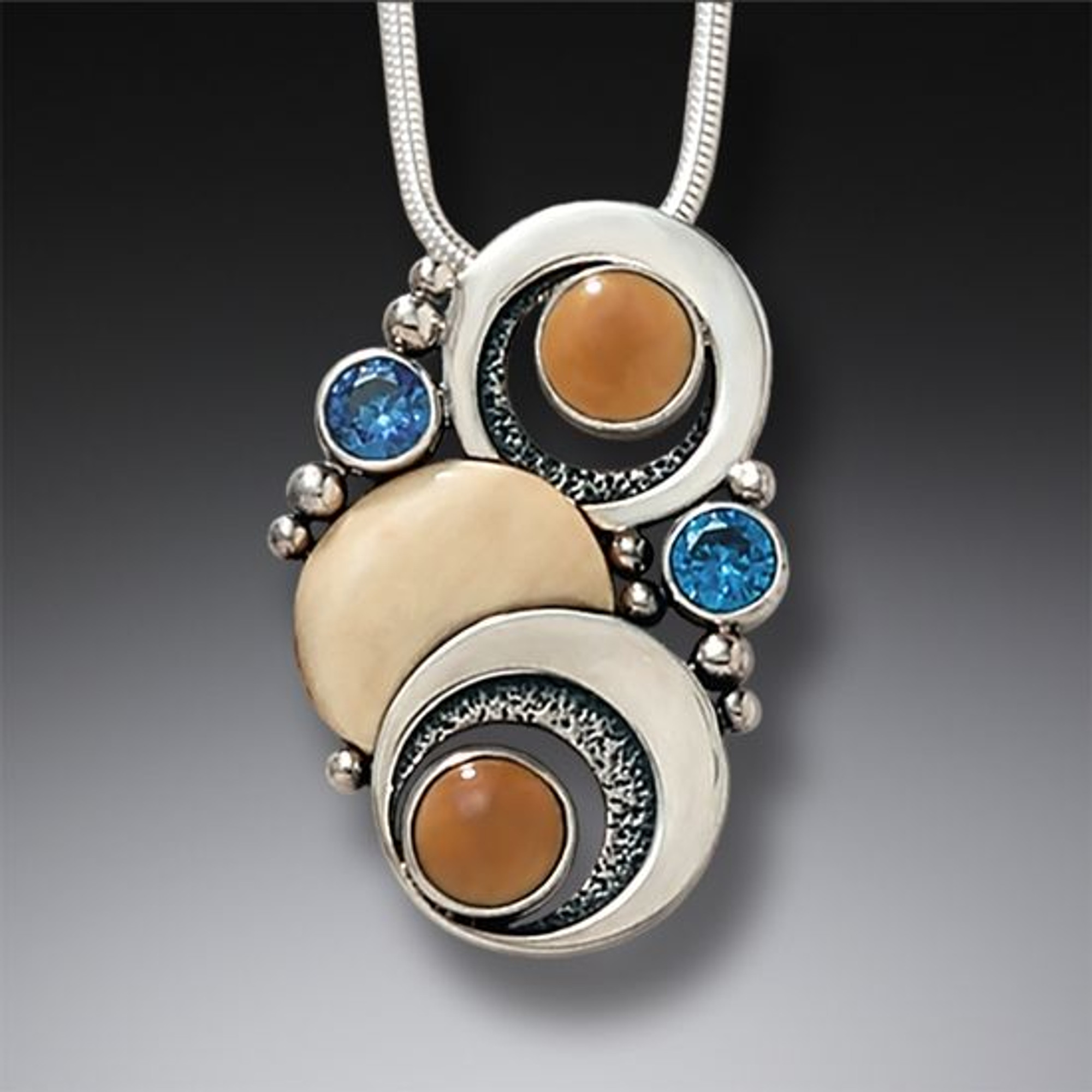 Fossilized Walrus Ivory Double Eclipse Moon Pendant with