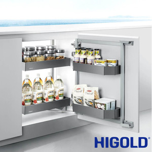 Modern kitchen with a Higold pull-out underbench mini pantry organizer featuring grey baskets, installed in a white cabinet in an Australian home.