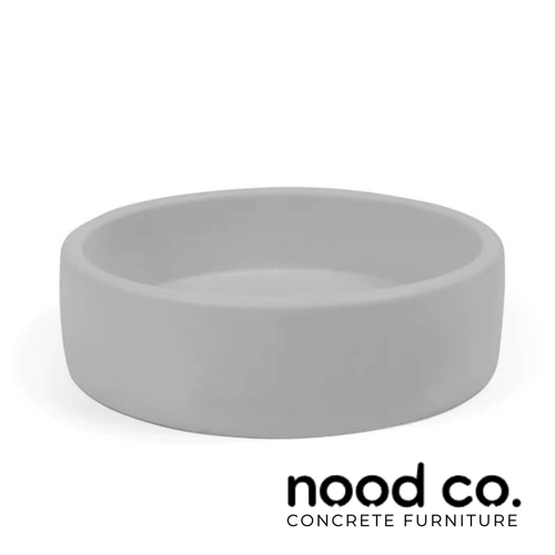 Modern Australian handmade Nood Co Cloud concrete surface mount round bowl basin for contemporary bathroom designs.