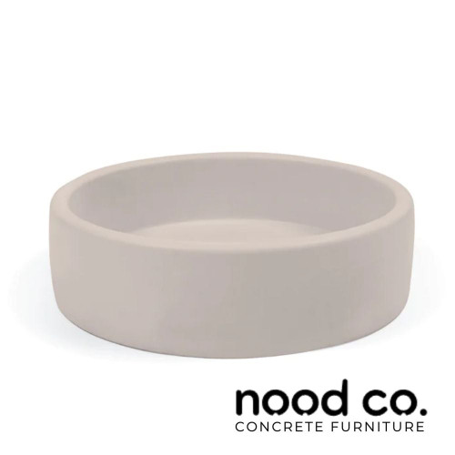 Modern Nood Co Nude concrete round surface mounted basin in a minimalist bathroom setting, available at Renovator Store Australia.