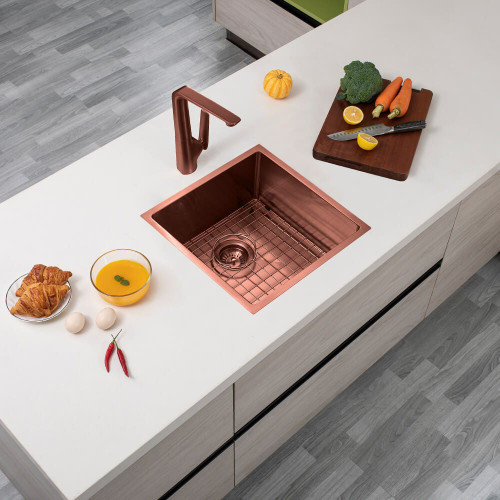 Modern Aguzzo 440mm rose gold stainless steel single bowl kitchen sink installed as a topmount in a contemporary Australian home.