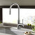 Modern Swedia Klaas Stainless Steel Kitchen Sink Mixer Tap installed in a contemporary Australian kitchen setting.