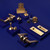 Manovella Satin Brass door hardware range including lever handles, hinges, and door stops for modern Australian home renovations.