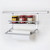 Wall-mounted stainless steel spice rack and paper towel holder for kitchen organization in Australia.