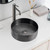 Modern round dark grey stainless steel bathroom hand basin from Alia, perfect for contemporary Australian home renovations.