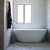 Meir Round Freestanding Bath Spout with Handheld Shower in Polished Chrome finish for modern Australian bathrooms.