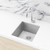 Meir Round Polished Chrome Kitchen Mixer Tap with Single Handle and 360 Swivel installed with Undermount Sink in Australian home kitchen.