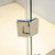 Modern frameless glass shower screen featuring a square stainless steel door handle for contemporary Australian bathrooms.